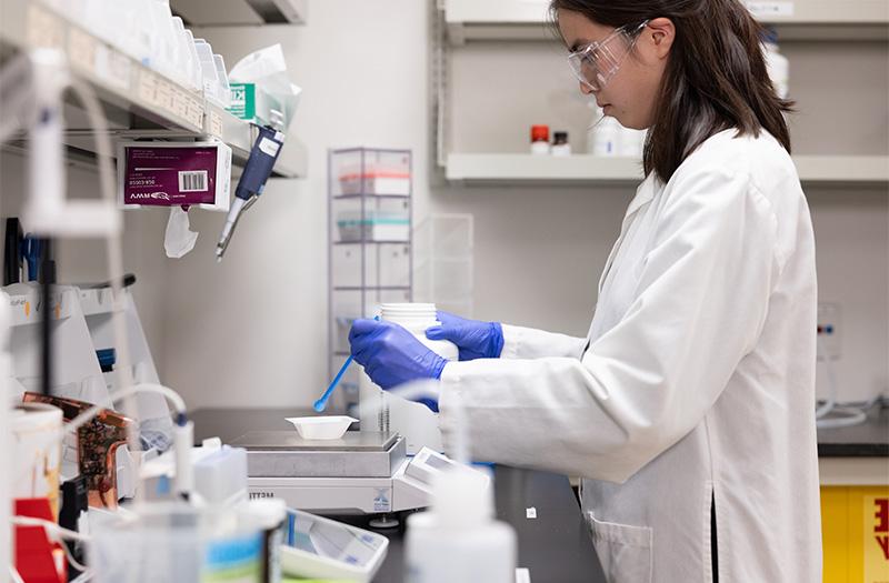 Employee working in lab.